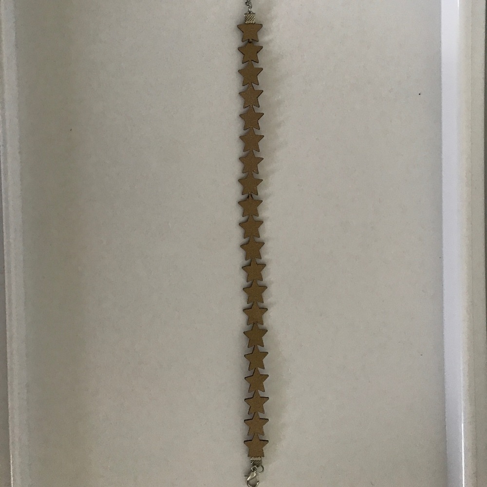Gold star choker.