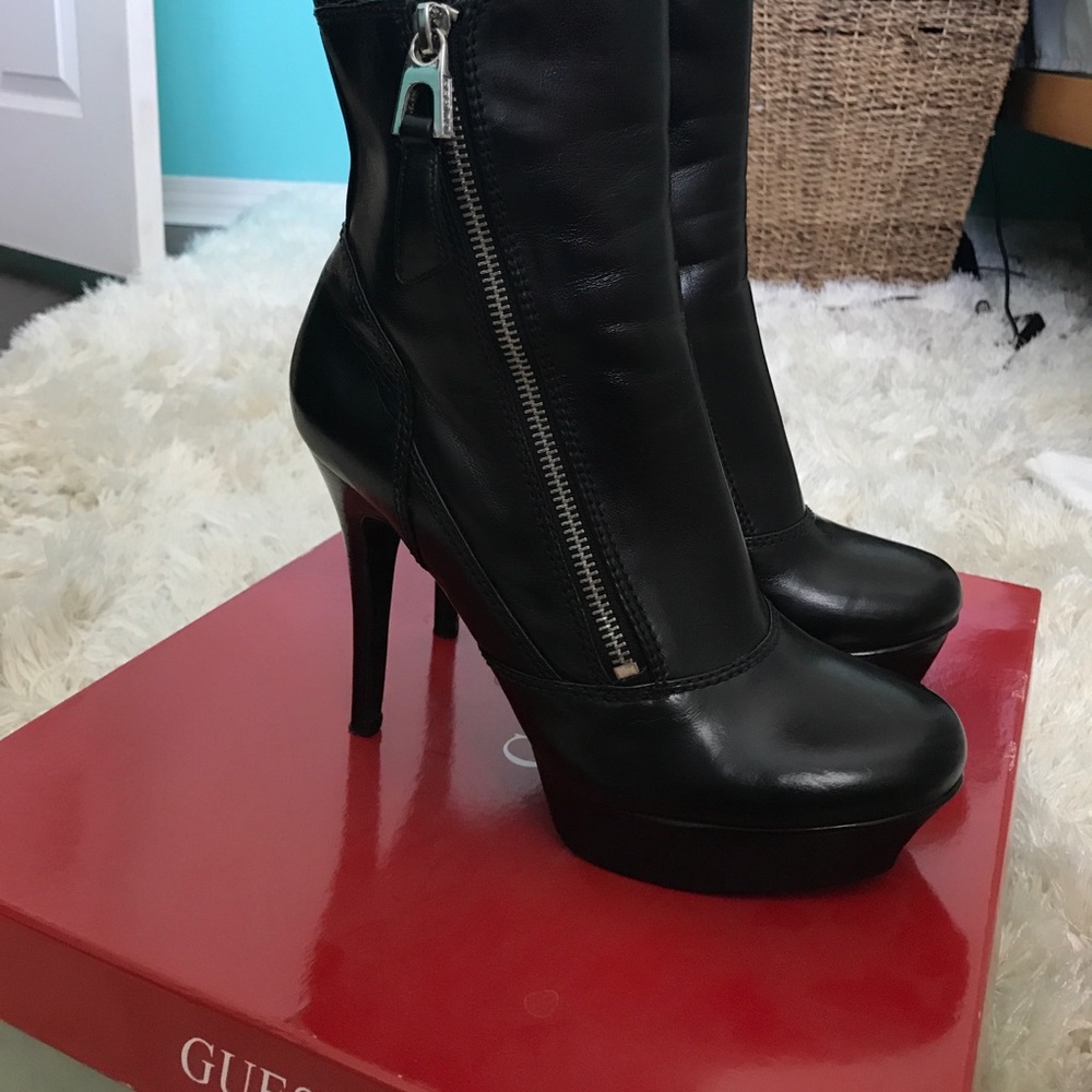 black leather heeled boots