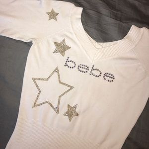 Bebe sweater with rhinestone stars and logo
