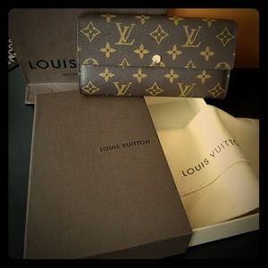 Authentic Louis Vuitton Sara wallet