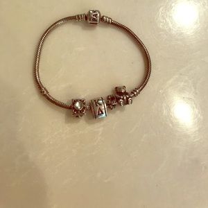 Pandora bracelet with 4 charms- all or individual
