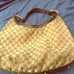 Authentic Gucci handbag brown used with wear