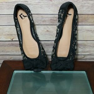 Black peep toe slip ons
