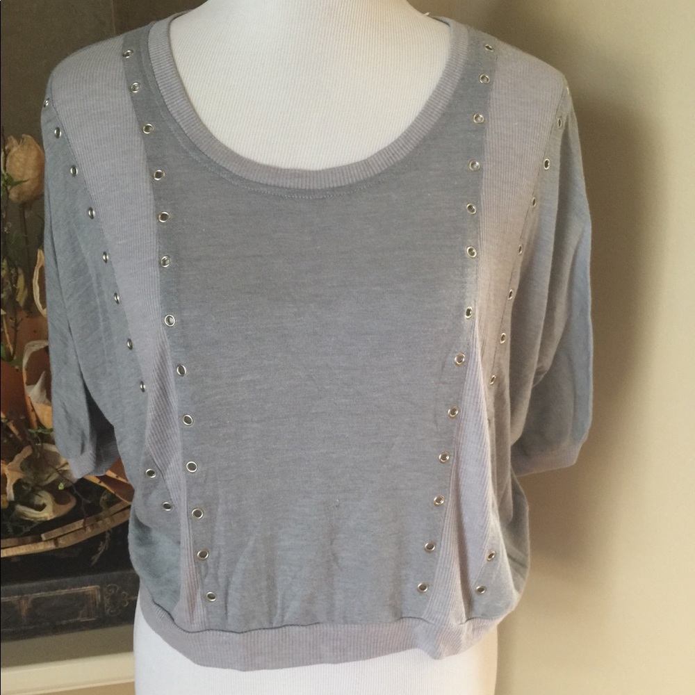 Gray top with silver rivets