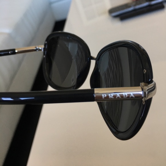 Prada sunglasses in black and silver hardware main image 5