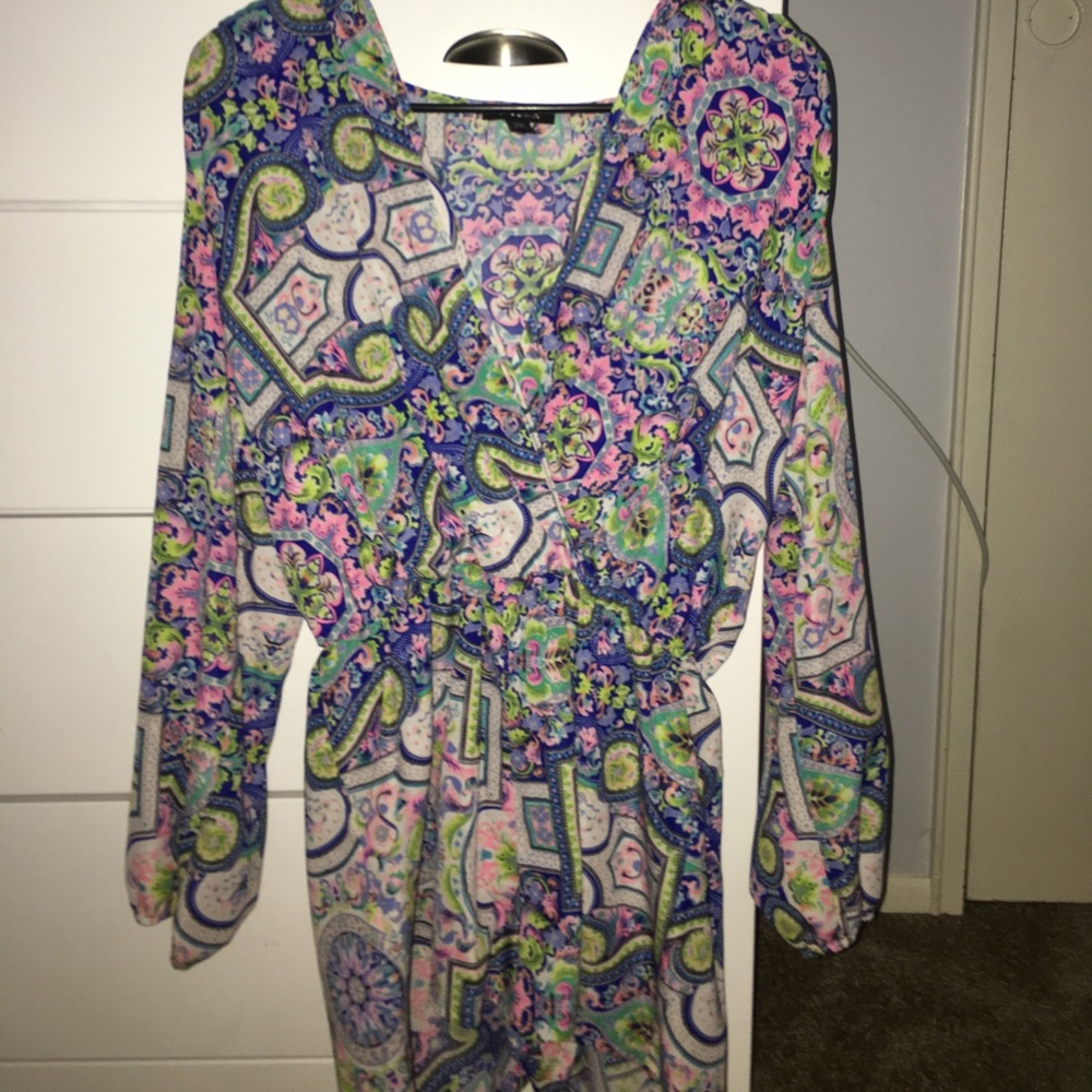 Bright bold patterned romper with open sleeves