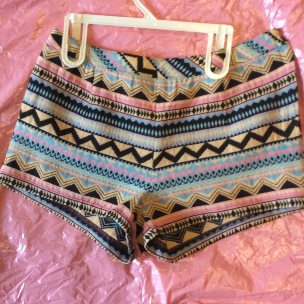 Textured Aztec patterned shorts.
