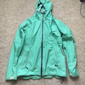 Green north face raincoat