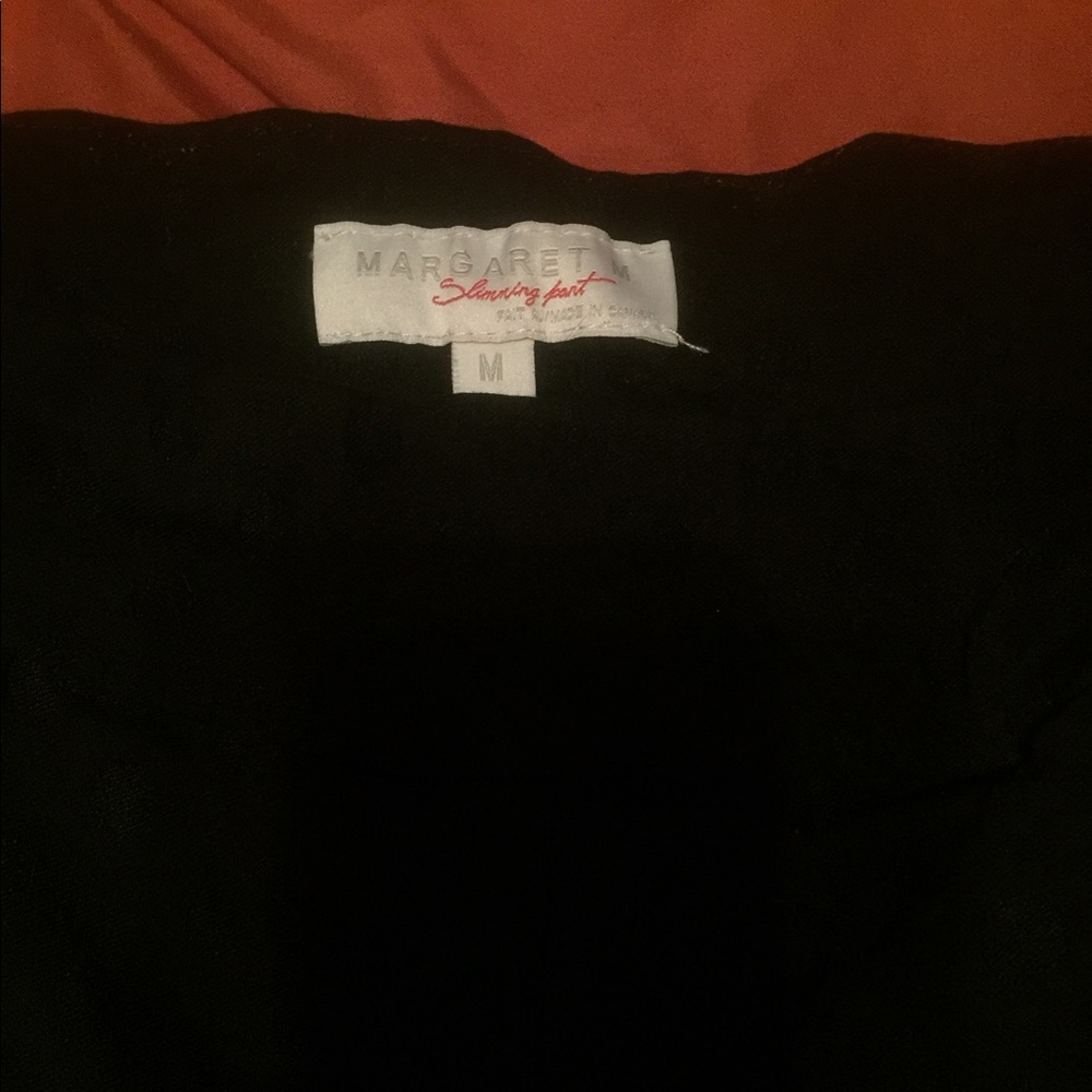 Margaret M. Emers. Black on black polka dots