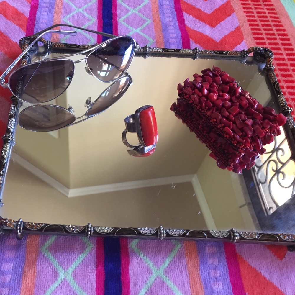 Red coral and sterling.    Yes it's real coral...