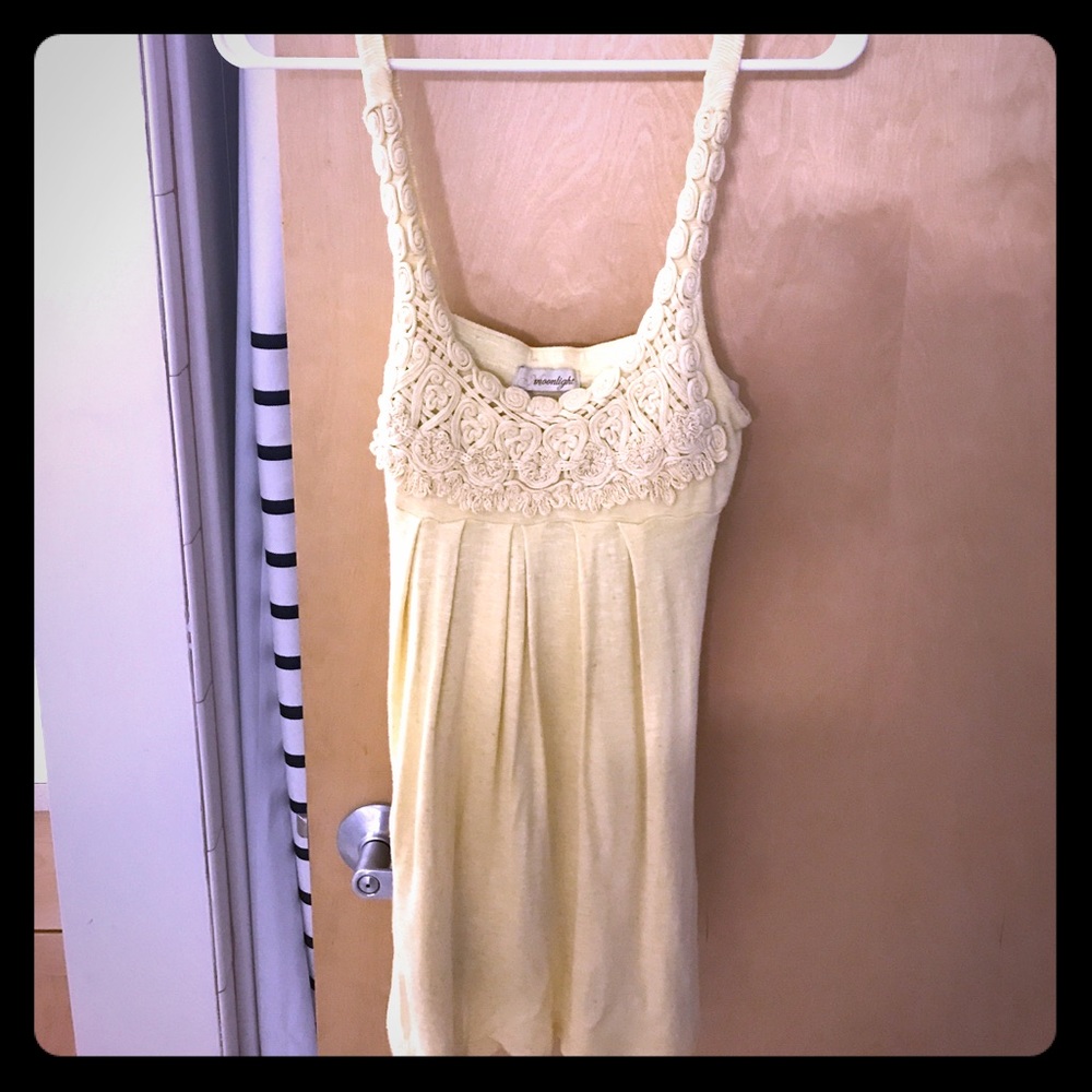 Pastel yellow tank top to dress up or down
