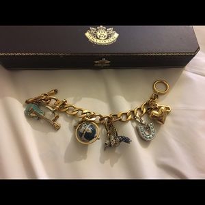 Juicy Couture charm bracelet and 3 extra charms