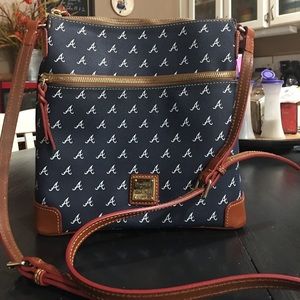 Dooney and Bourke shoulder strap/crossbody bag.