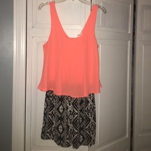 Coral and black romper