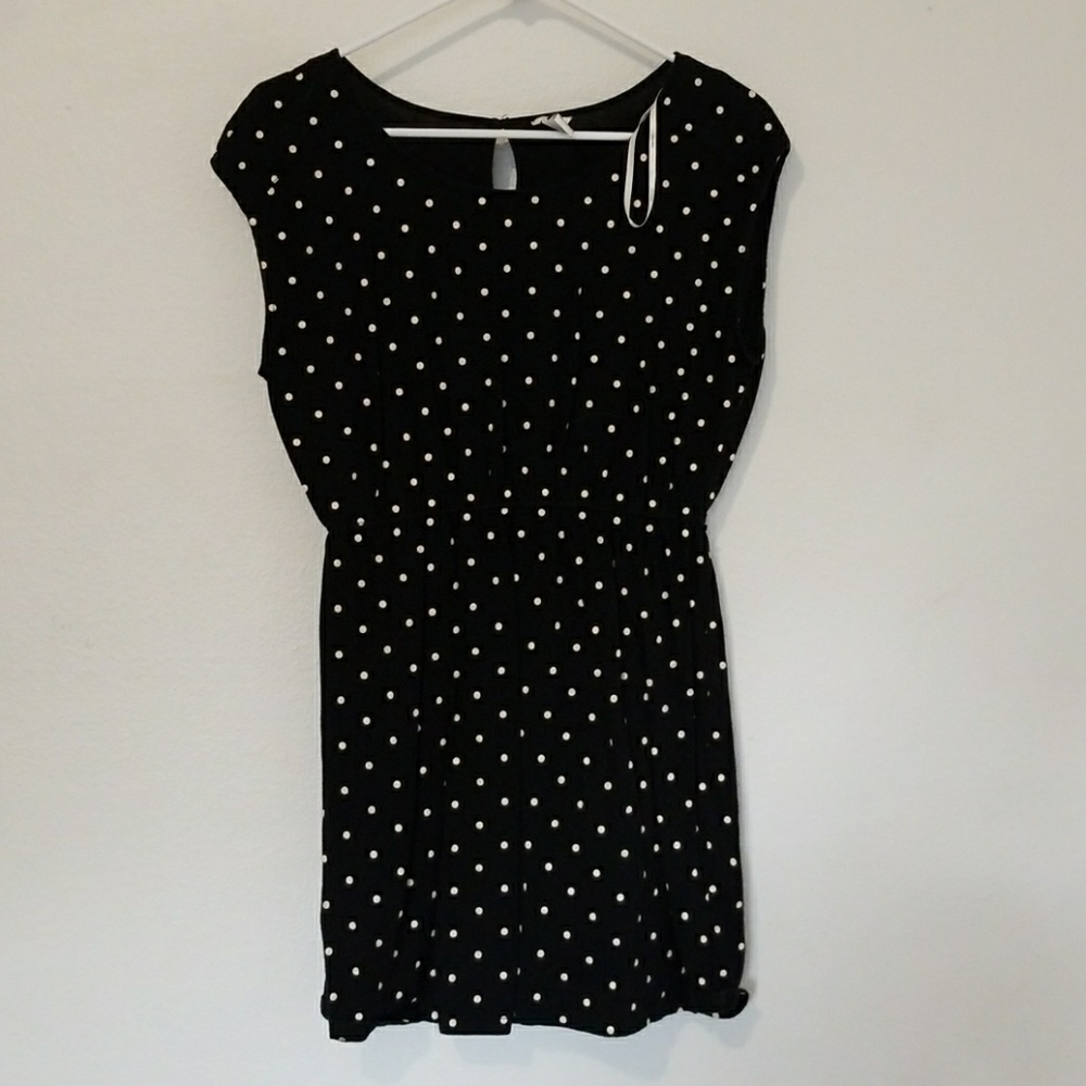 Black polka dot shirt