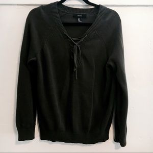 Lace up, hunter green sweater.