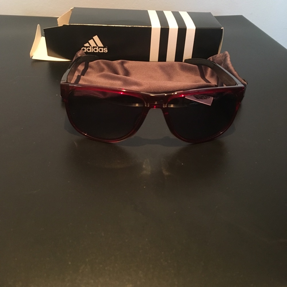 Sprung red and black adidas sun glasses