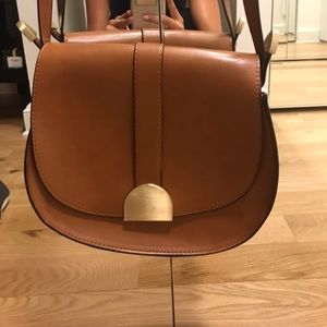 Tan crossbody with gold hardware