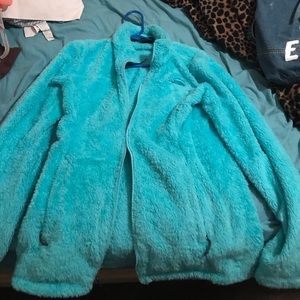 Fuzzy blue North Face coat