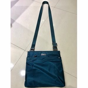 Small cross-body TUMI purse