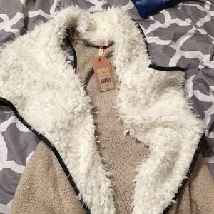 Brand new women's cardigan with tags,size medium!