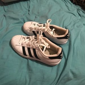 black and white Adidas sneakers