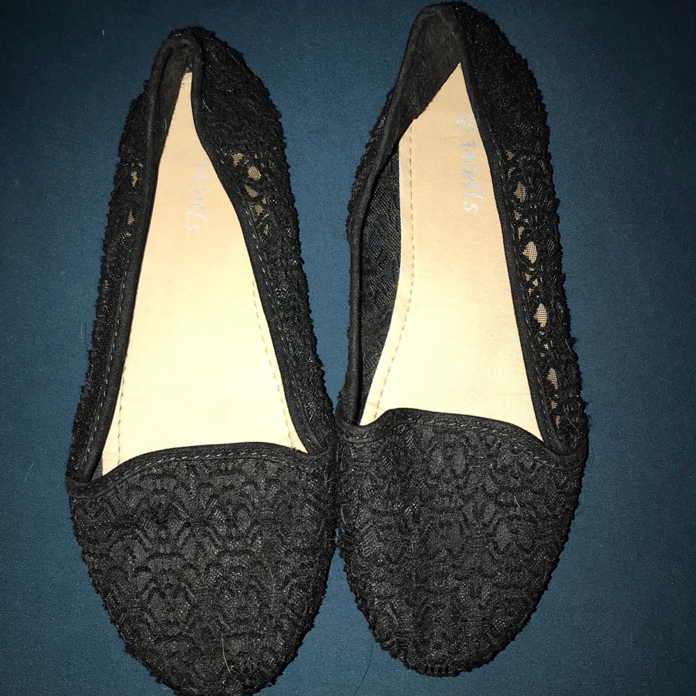Black lace slip-ons