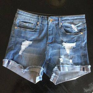 High waisted distressed denim shorts