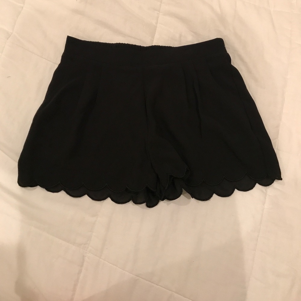 Black scalloped hem shorts
