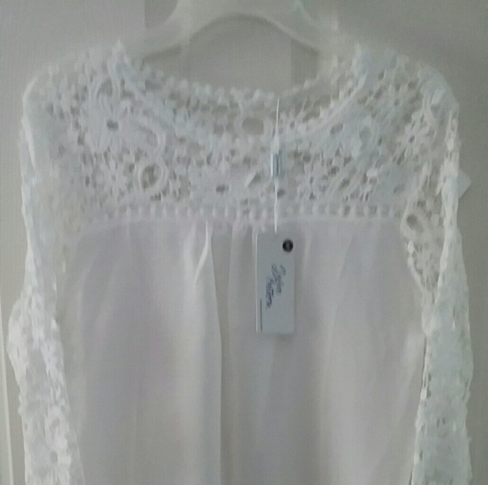 White soft lace/silk style blouse.