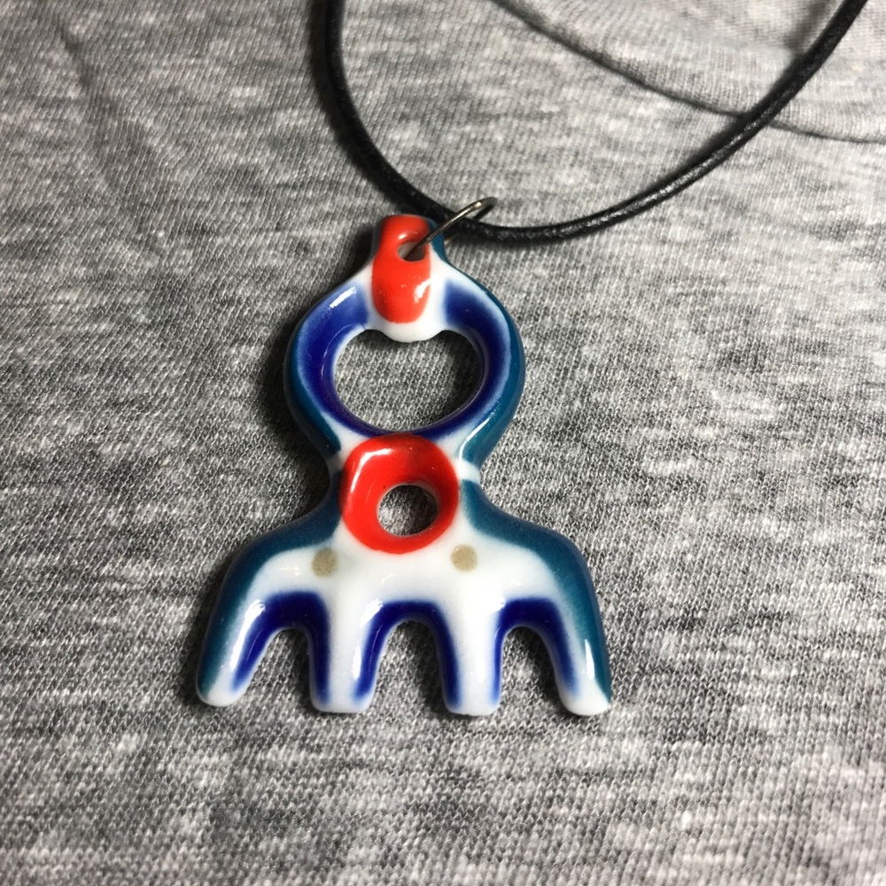 Spanish porcelain necklace on leather thing