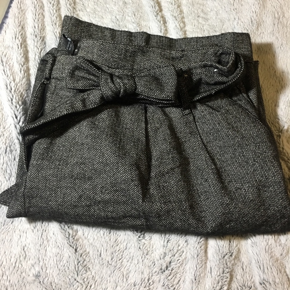Wide leg cuffed trousers make an offer