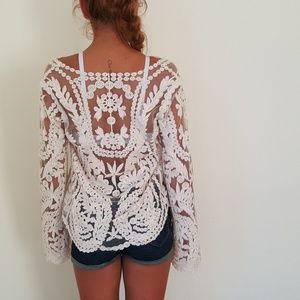 white floral long-sleeved lace shirt