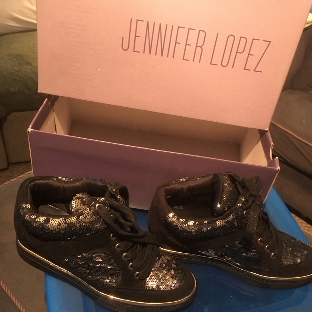 Jennifwr Lopez wedge sneakers.