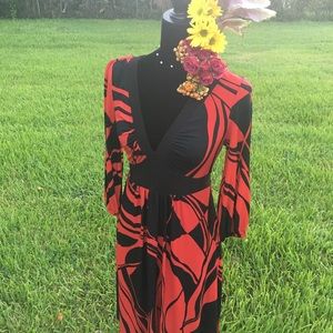 Black and red gathered waist wrap style dress