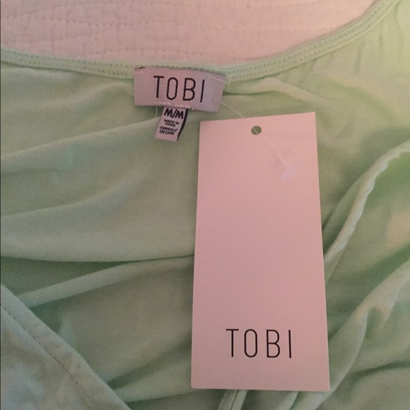 Mint green dress with cut out sleeves - Picture 2 of 2