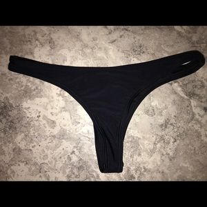 black swimsuit thongs