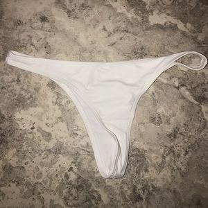 white swimsuit thongs