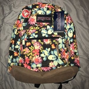 Jansport multi colored flower design backpack