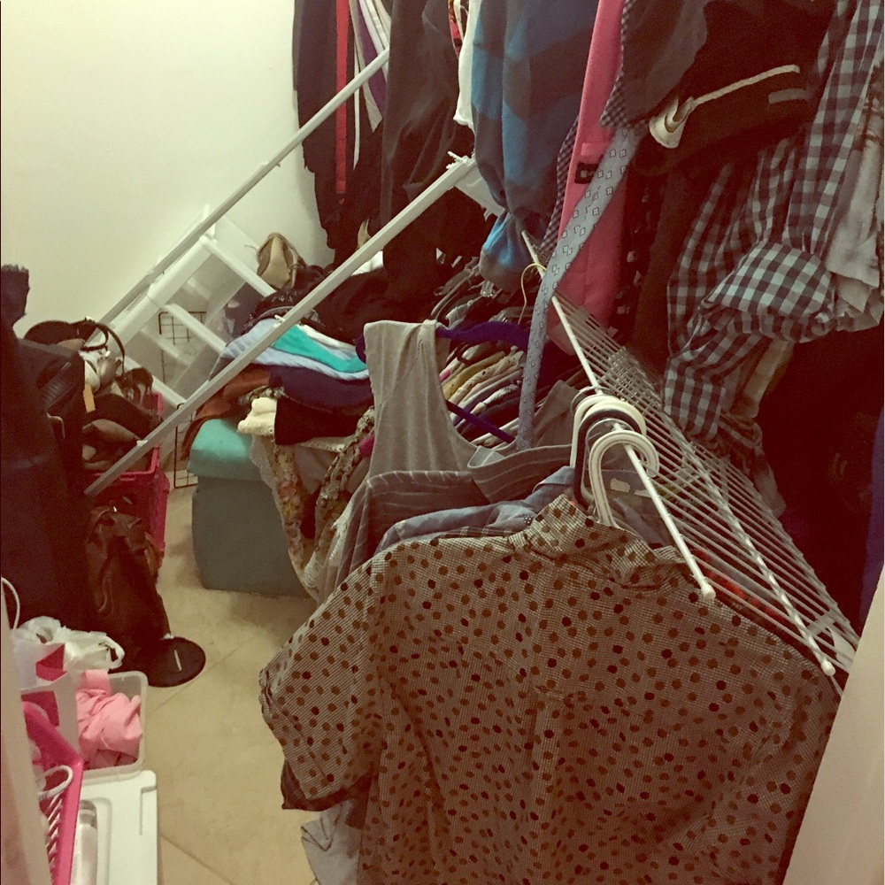 I have so many clothes the closet rack tore out !