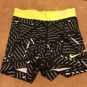 Black, white, and yellow Nike training shorts S