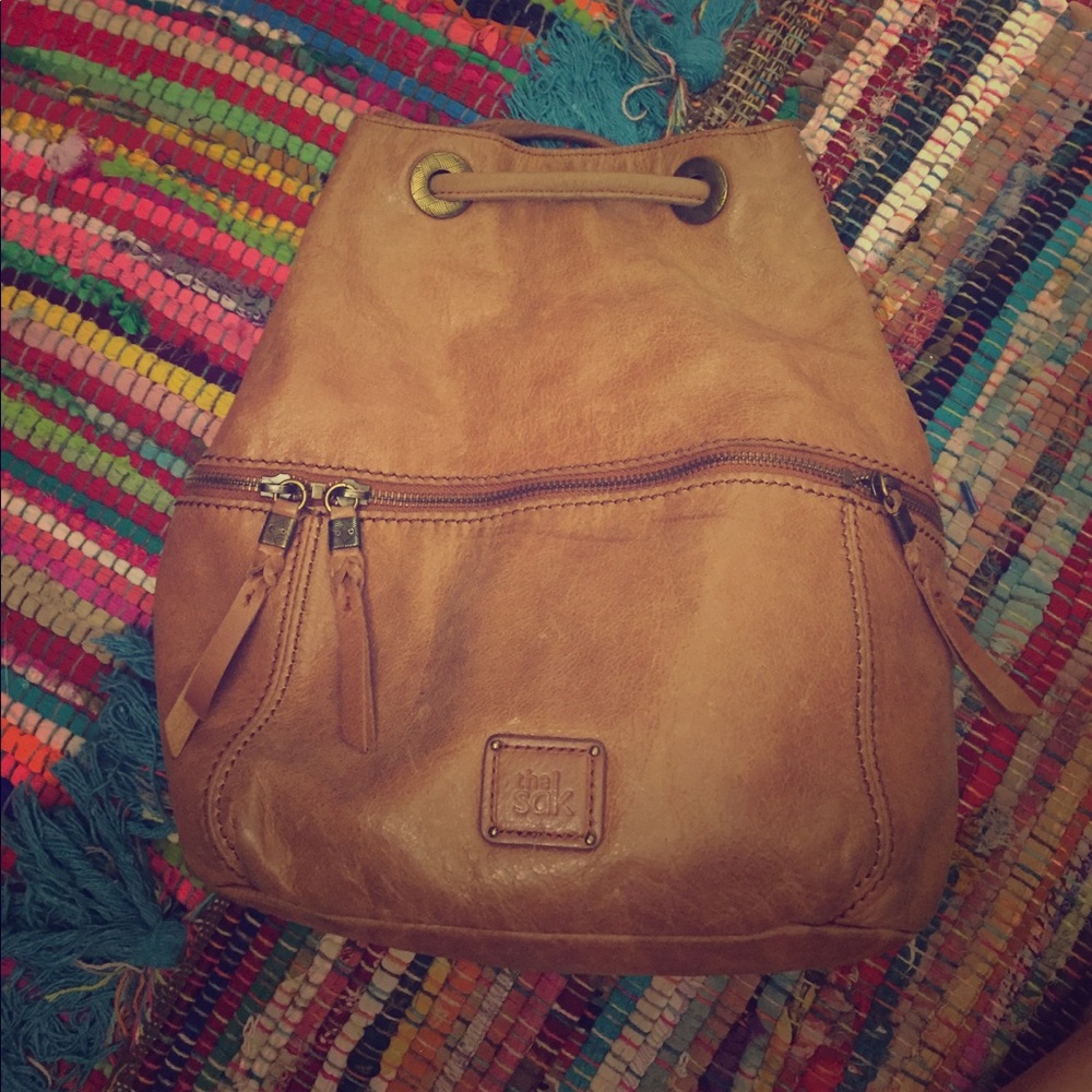 The sak tan leather back pack