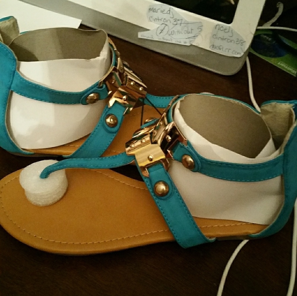 Blue sandals with gold.