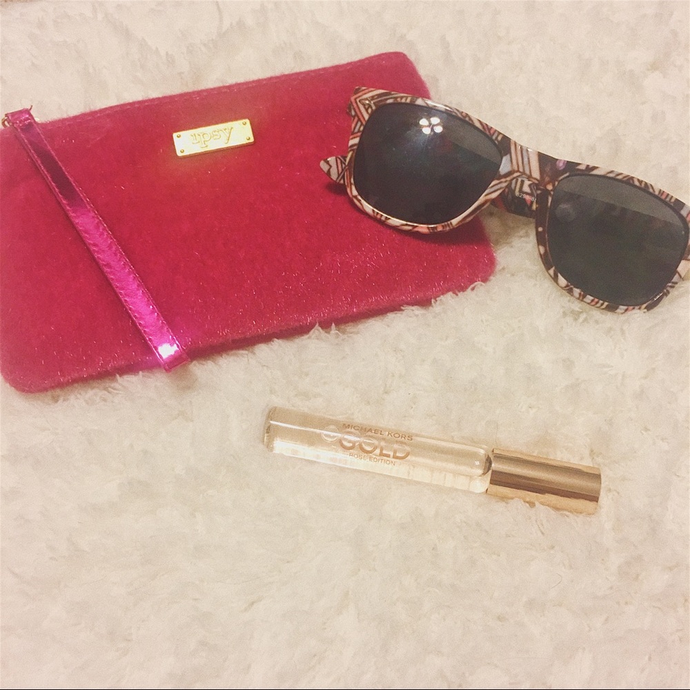 Geometric design sunglasses with Ipsy bag.