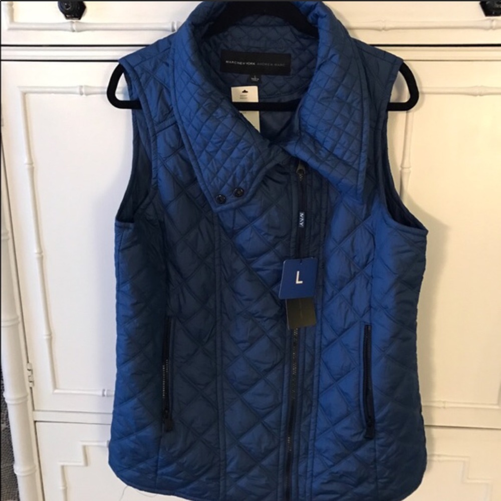 New never worn blue puffy vest.