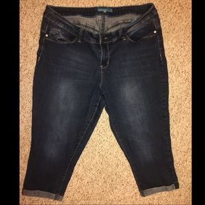 Dark jean capris with small cuff roll on legs
