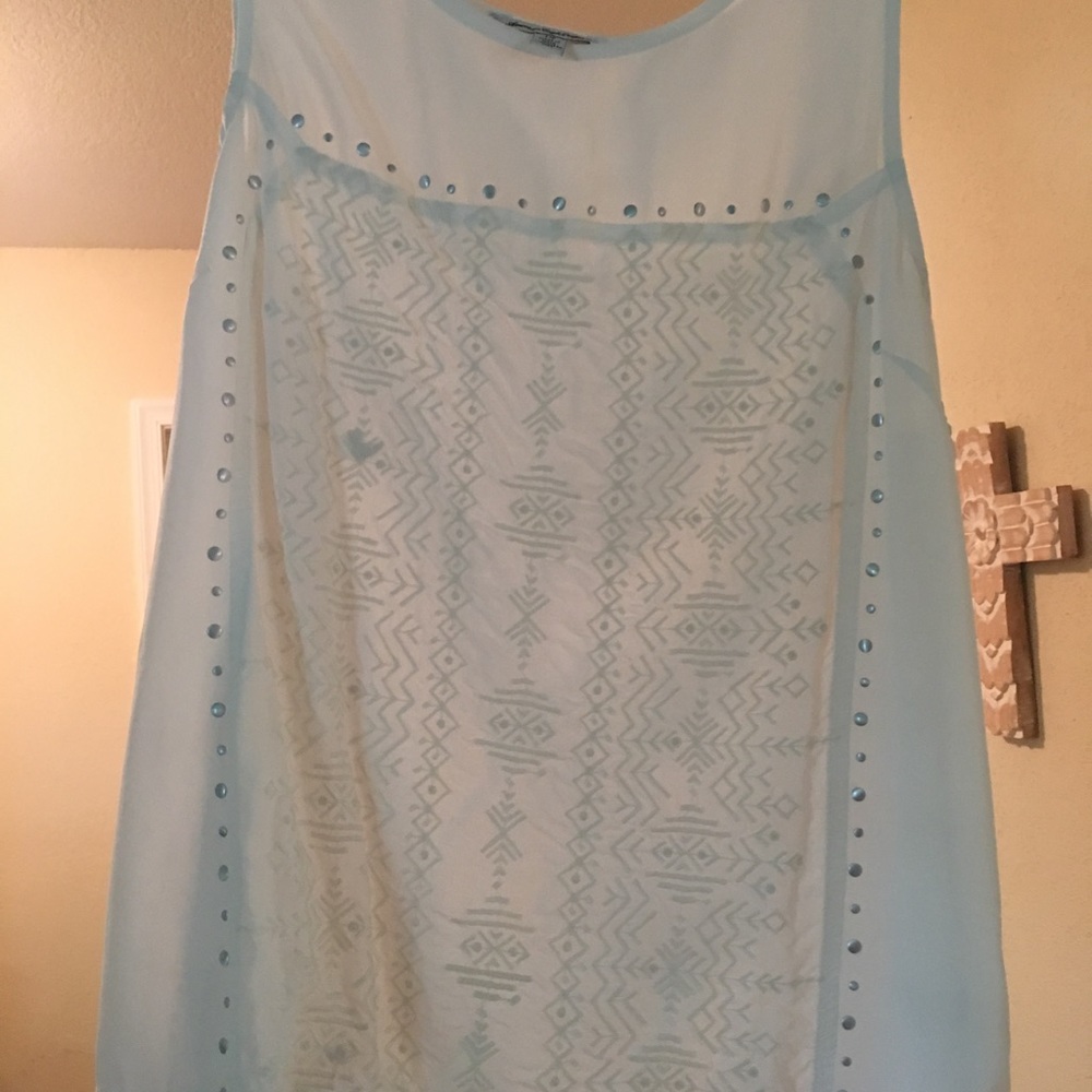 Cream colored tank tops