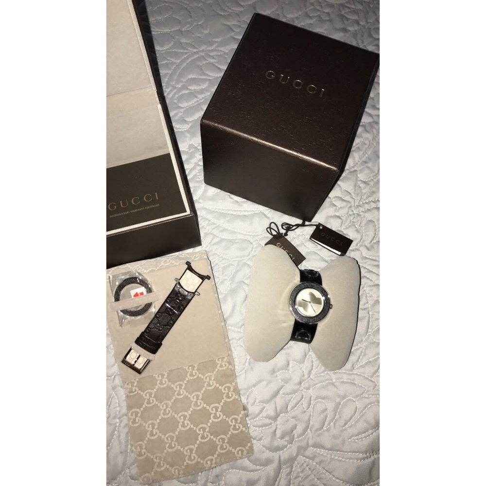 Round gray Gucci analog watch with box