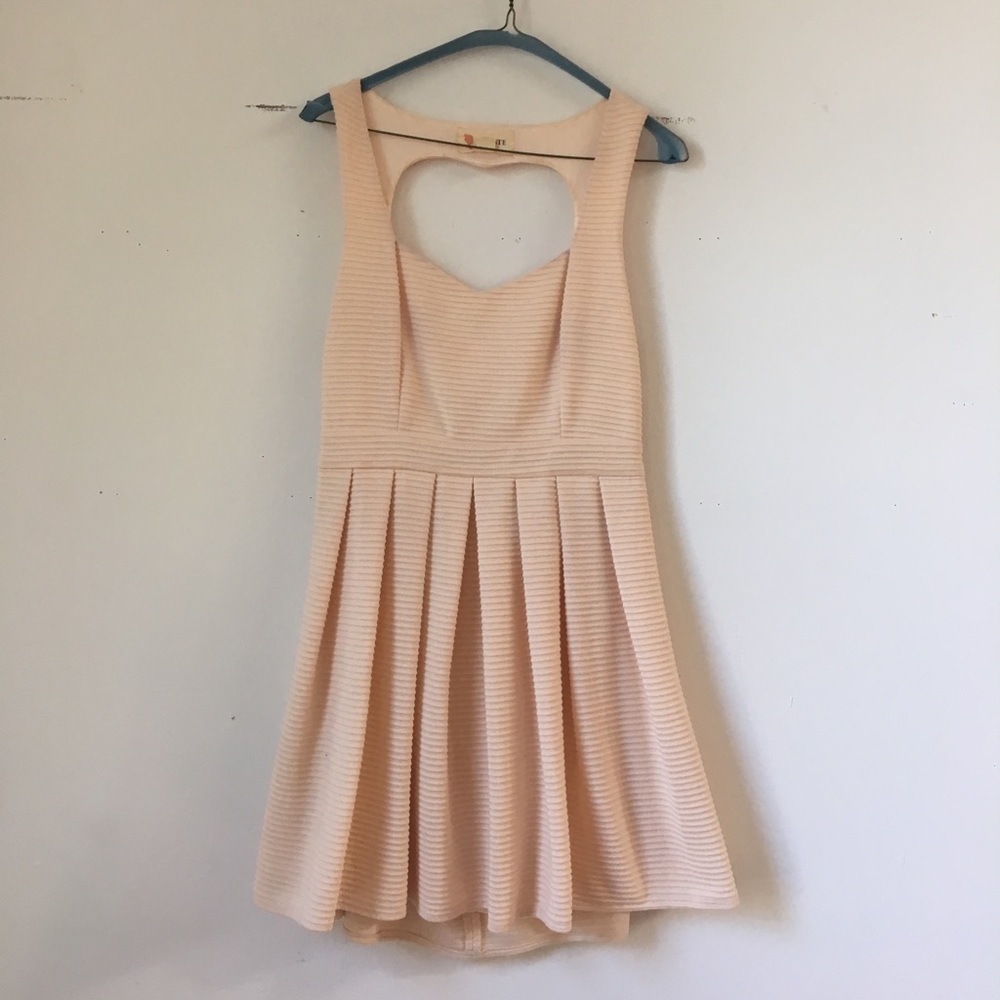 Cream pleated dress, heart shaped back size L