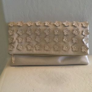 Ivory clutch with floral pedals